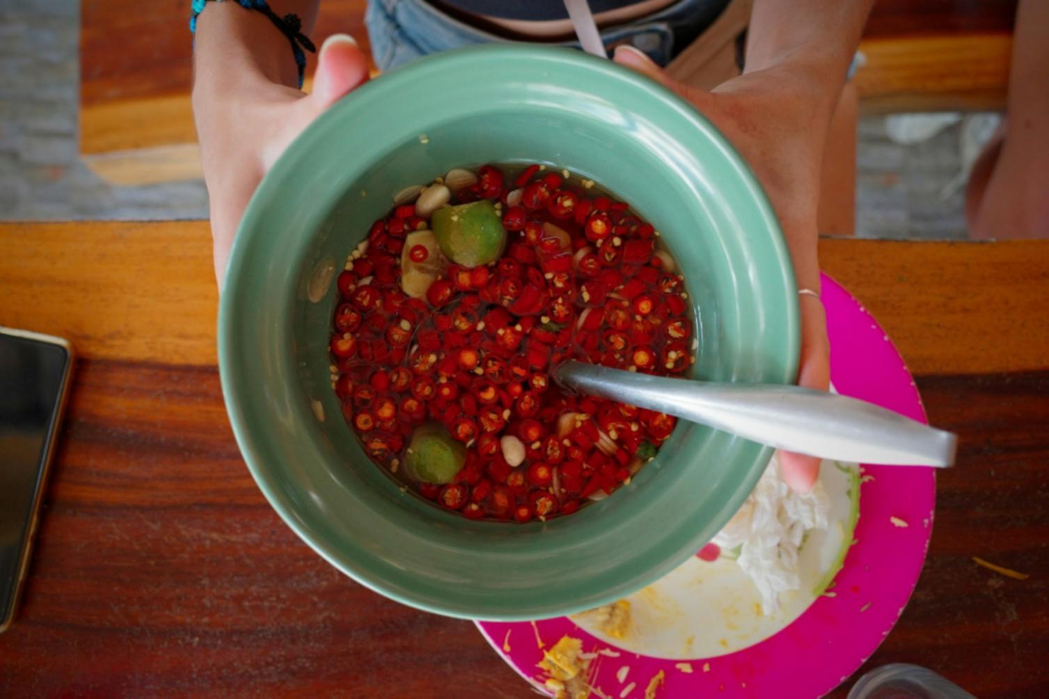 Pizza preparation workspace showing traditional dough-making techniques and professional kitchen setup